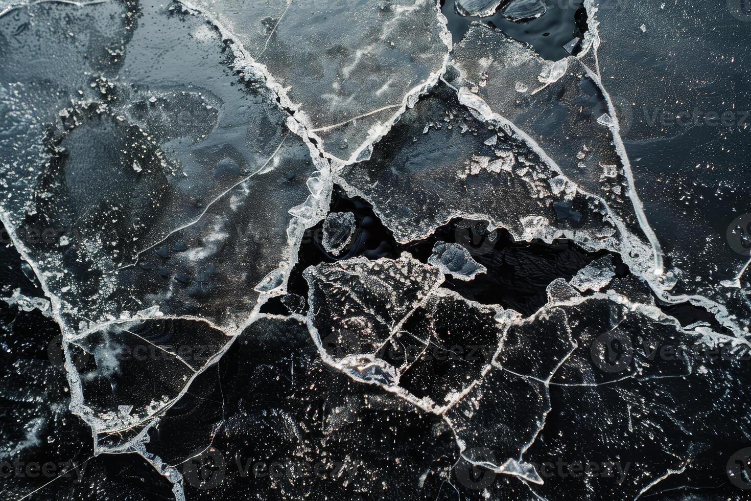 A close up of a cracked ice surface photo