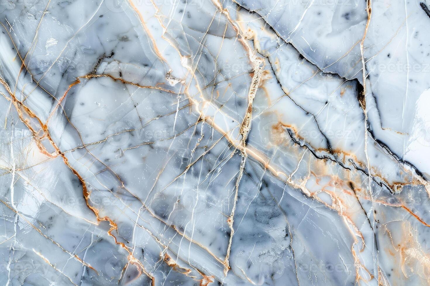A marble wall with a gold and white pattern photo