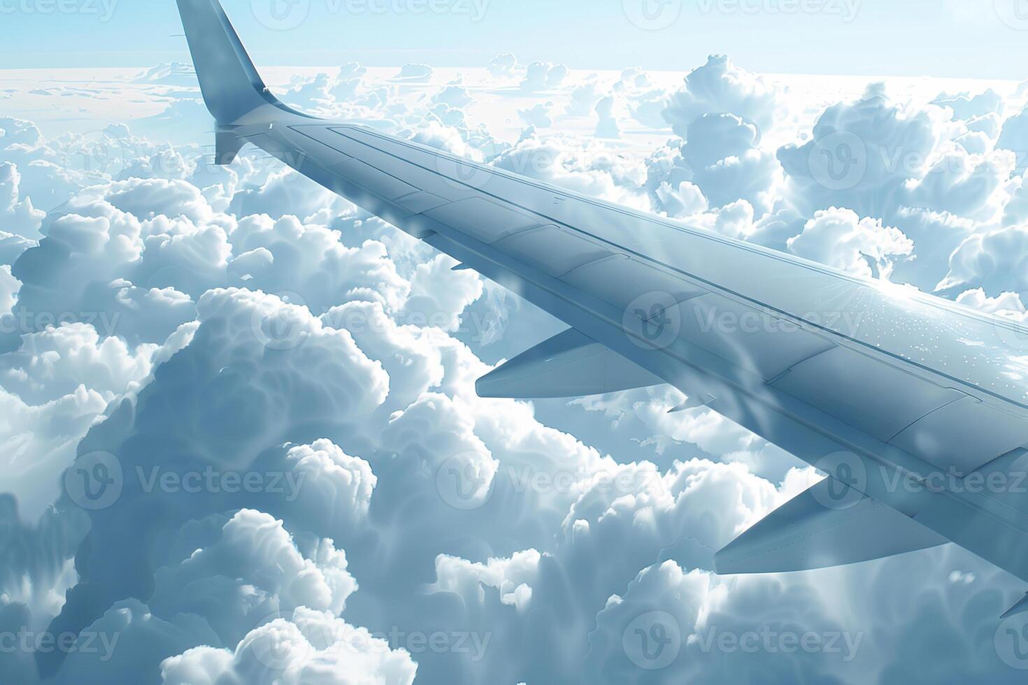A view of a plane flying through the clouds photo