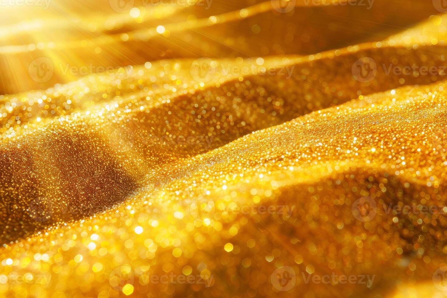 A golden sand dune with a sun shining on it photo