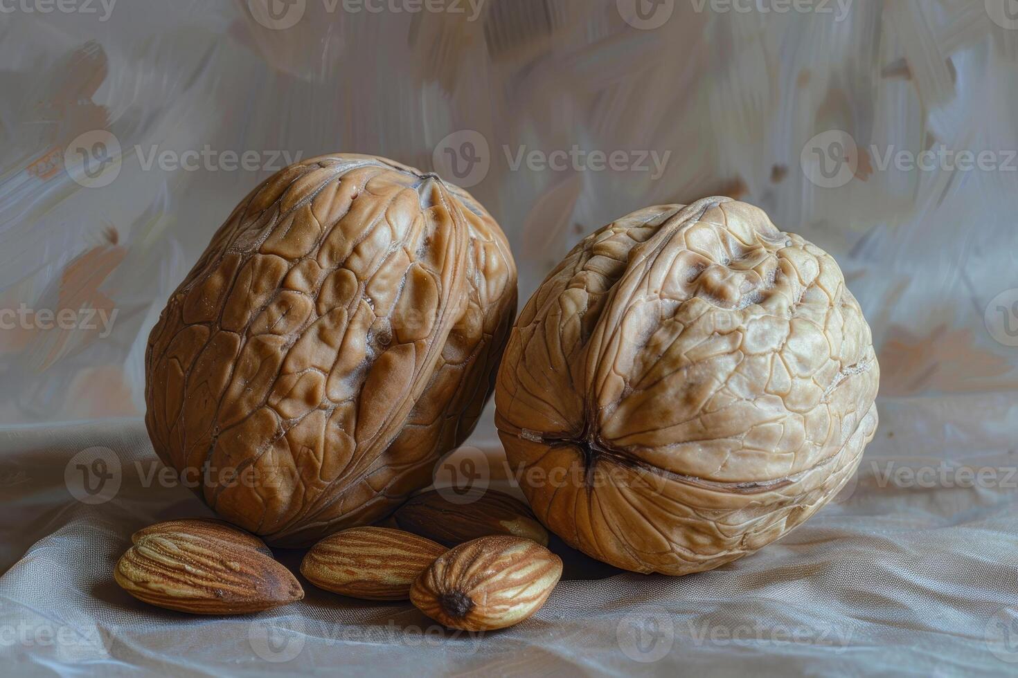 Two large walnuts and several almonds are positioned on a softly textured background, highlighting their unique shapes and colors under warm light photo