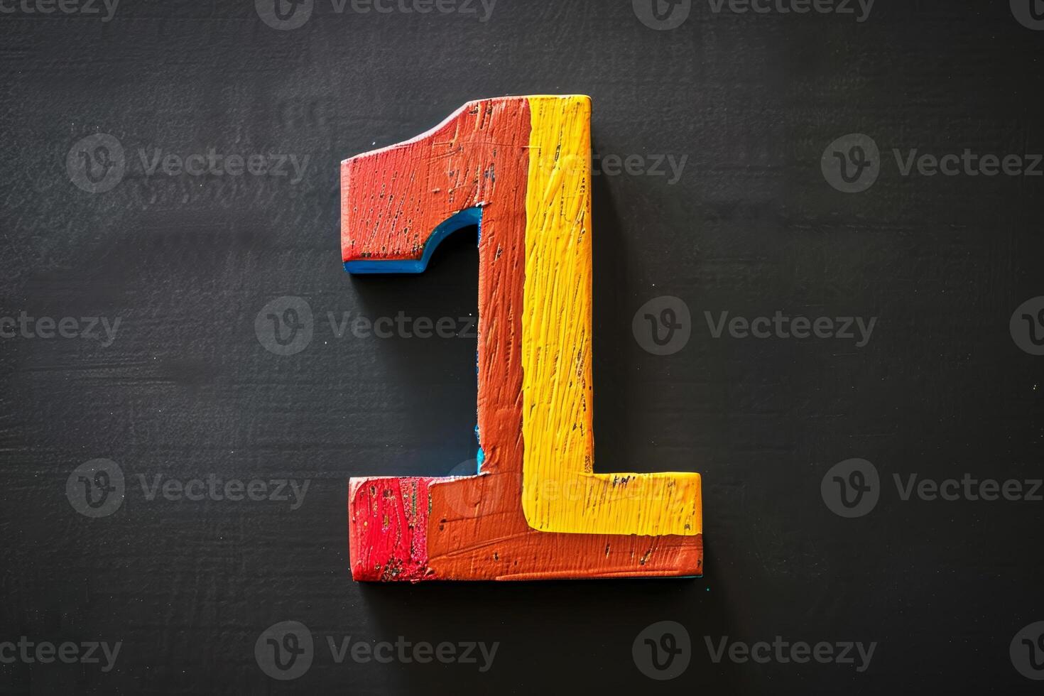 A wooden number 1 with a red, yellow and blue paint job photo