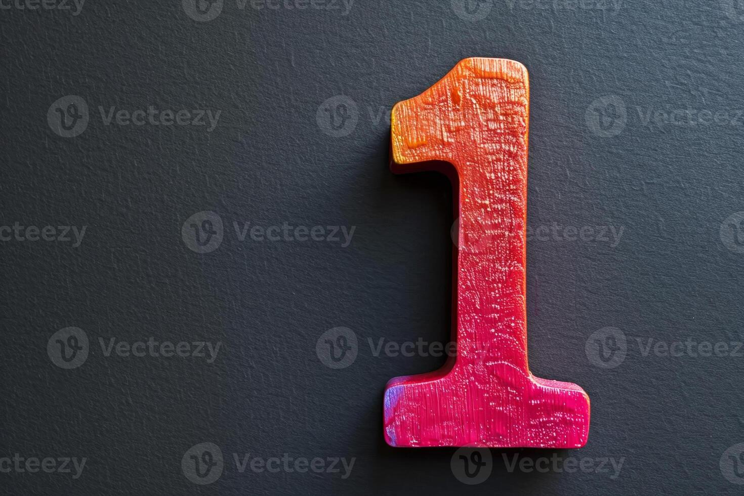 A colorful number 1 is on a black background photo