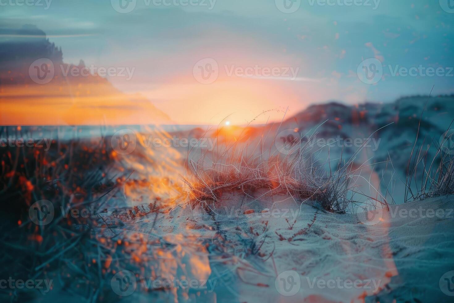 The sun sets beyond the horizon, casting warm colors across the sky and reflecting on the calm ocean water, while gentle waves lap against the sandy shore photo