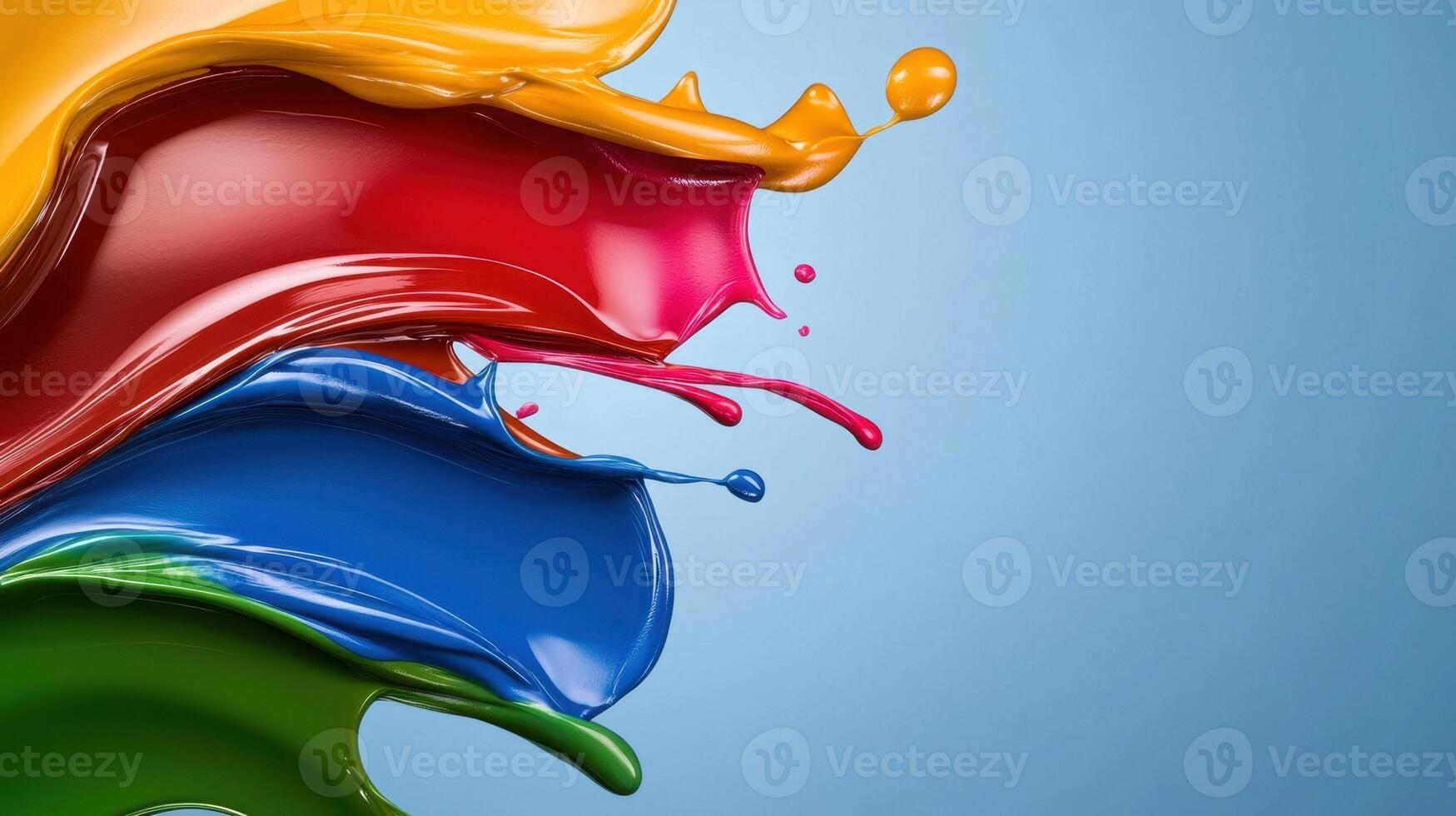 A colorful splash of paint on a blue background photo