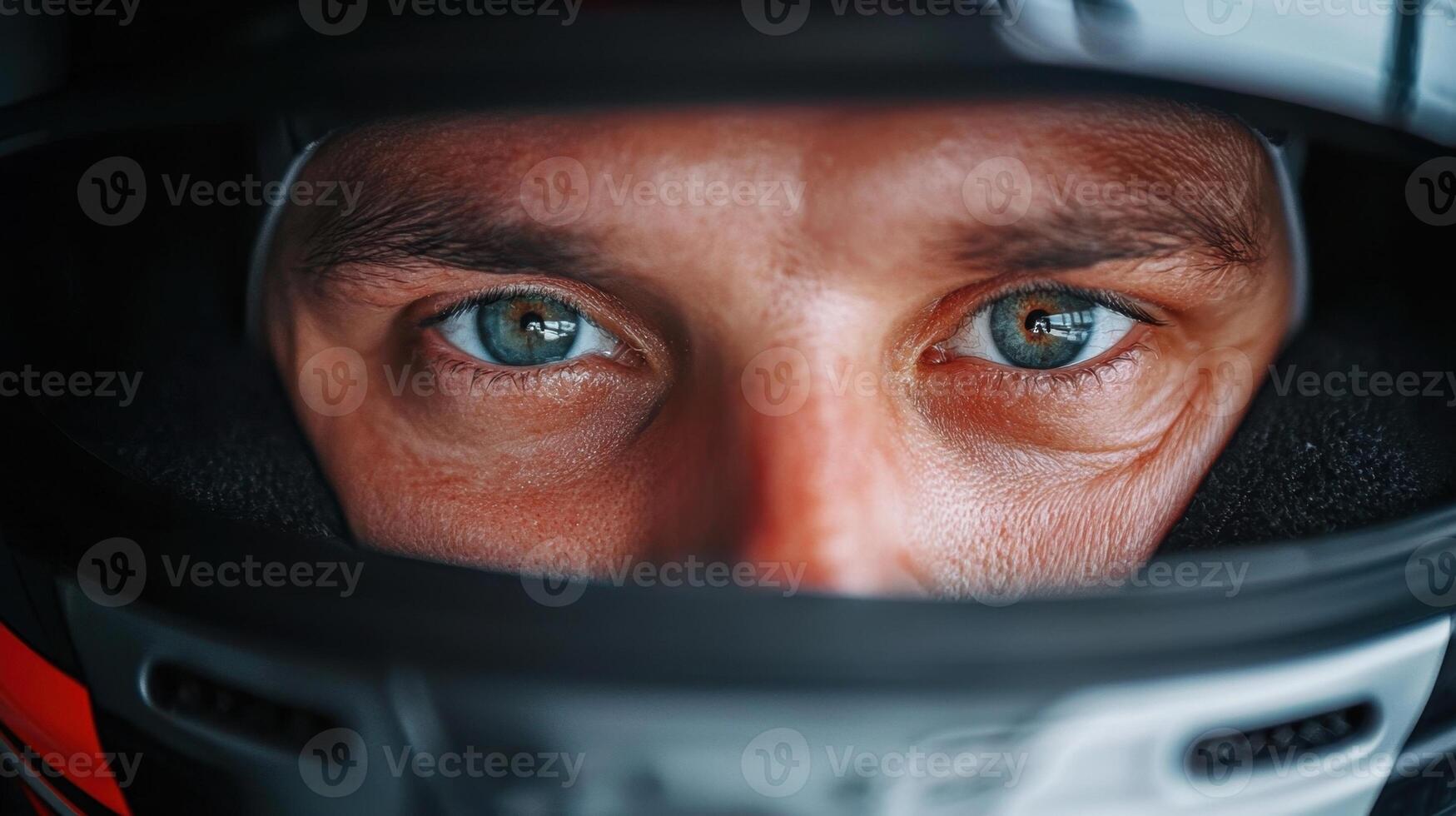 Close up of a man in a racing helmet photo