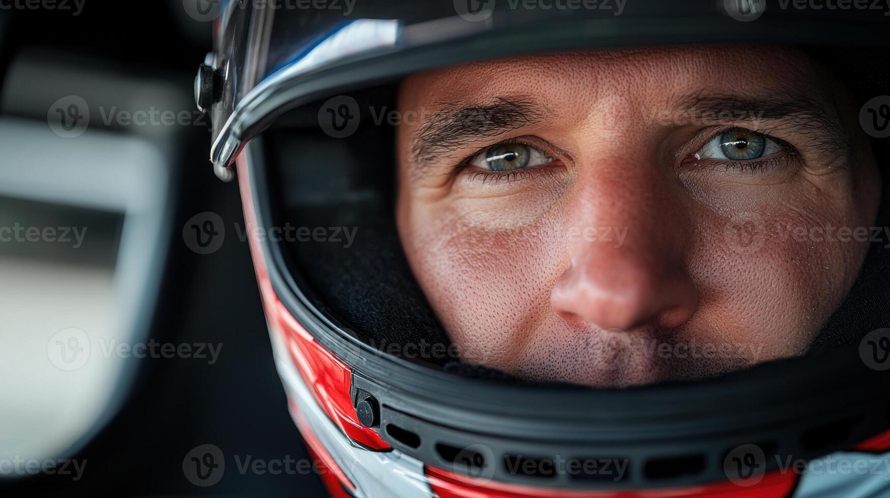 A man wearing a helmet with a red and white design photo