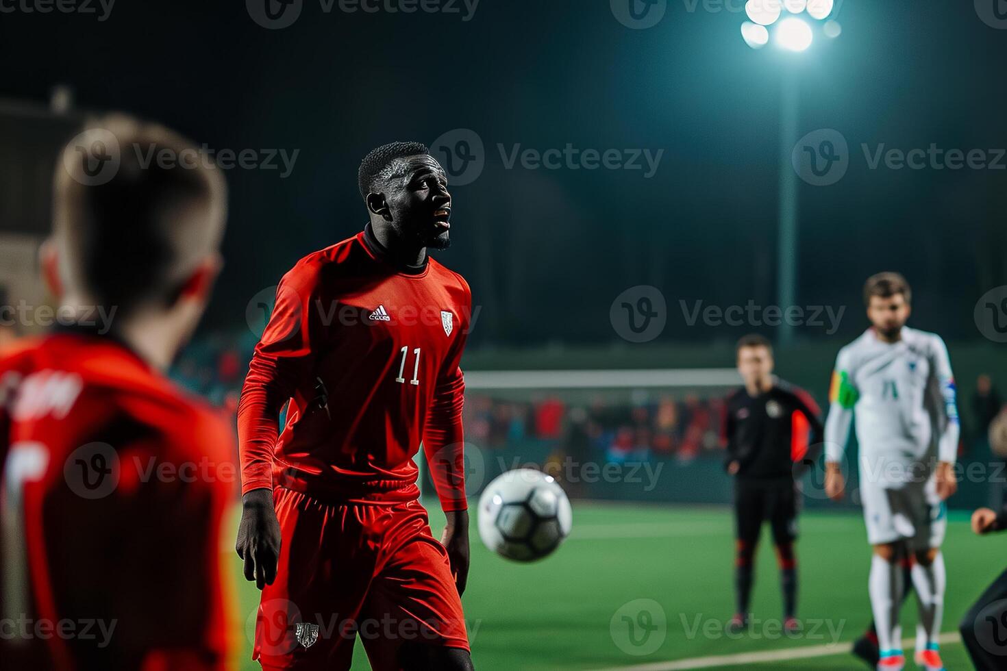 Soccer players on a field photo