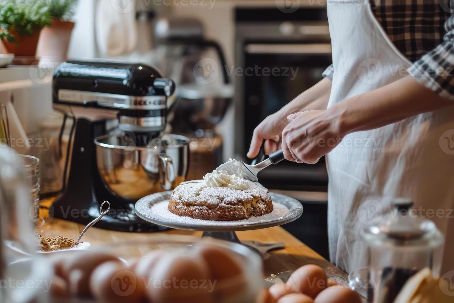 A person is making a cake in the kitchen photo