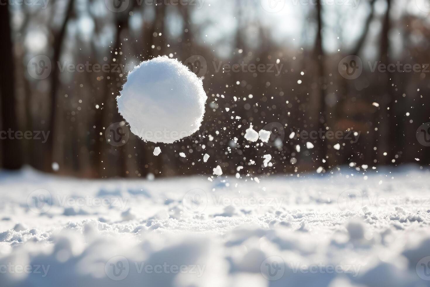 A snow ball is flying through the air photo