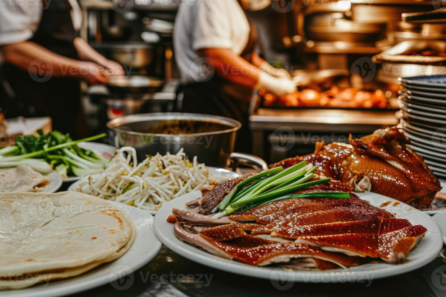A chef is preparing food in a kitchen photo