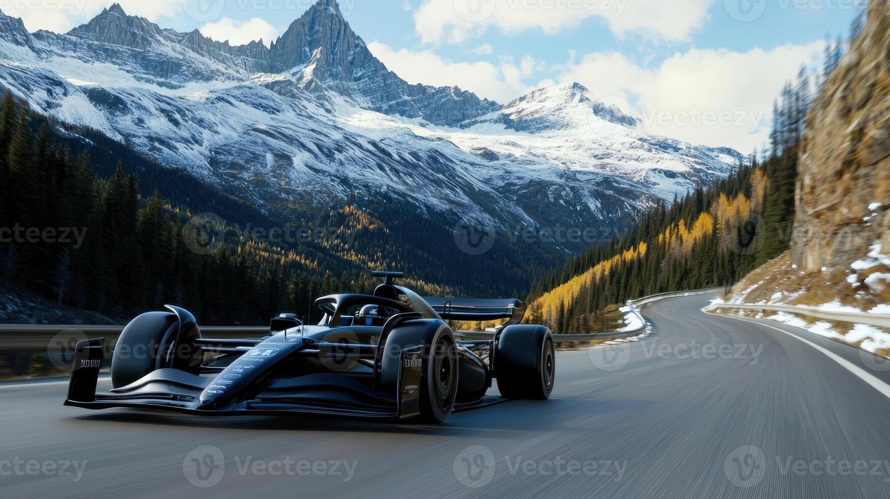 A black race car is driving down a snowy mountain road photo