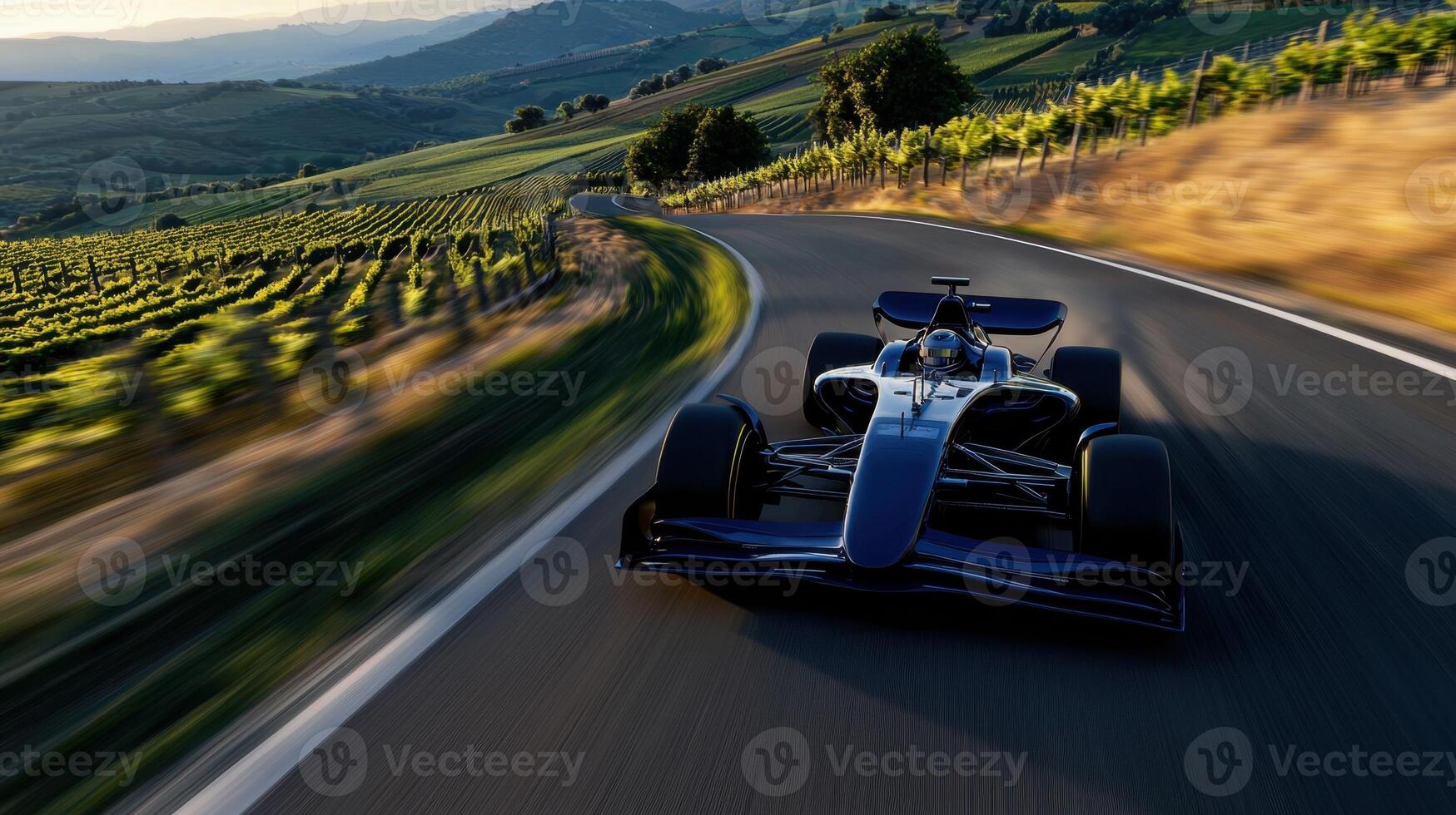 A race car is speeding down a winding road photo