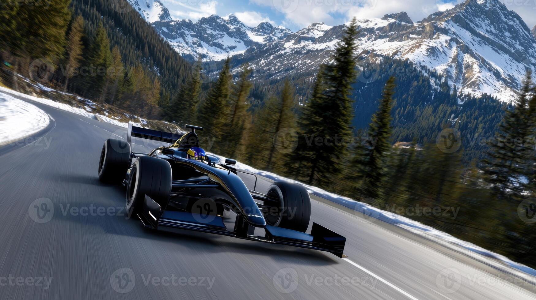 A black race car is speeding down a snowy mountain road photo