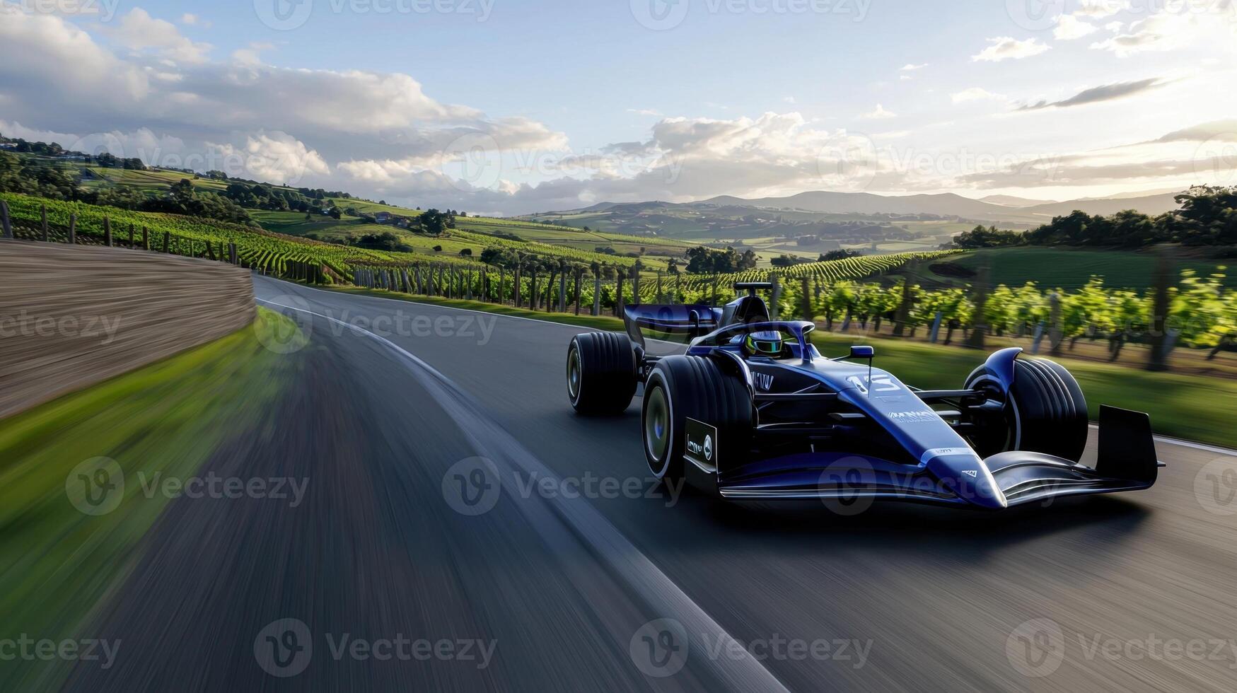 A blue race car is speeding down a track photo
