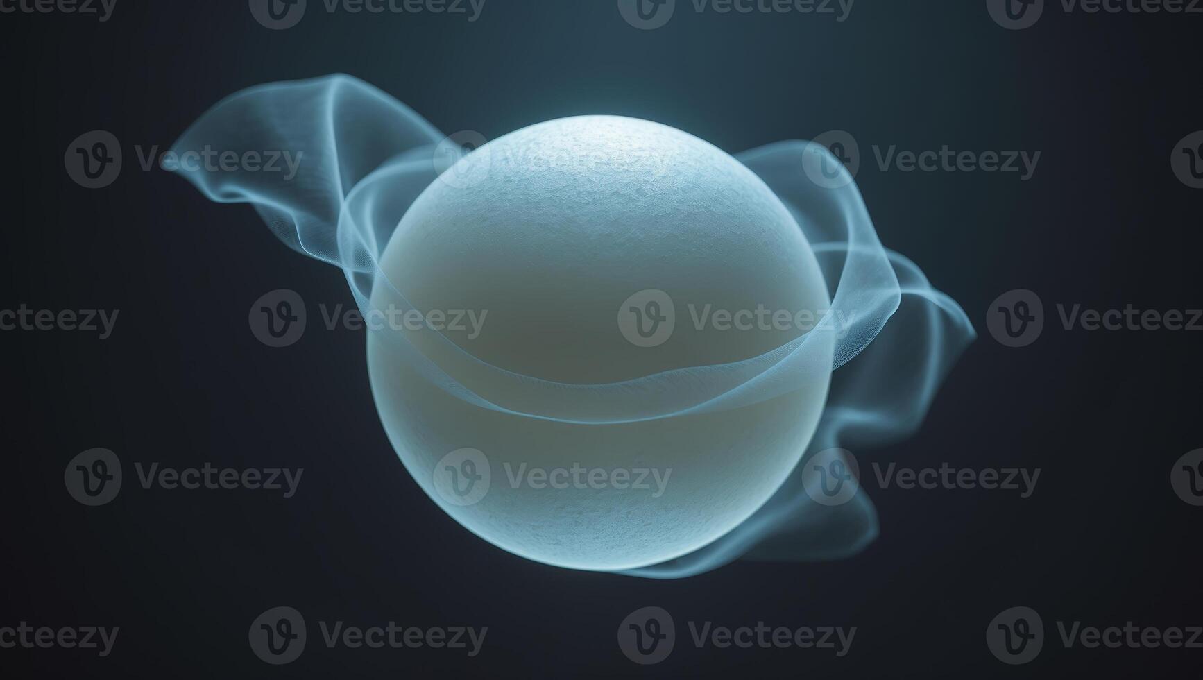 Floating glowing orb surrounded by ethereal wisps on a dark backdrop at a tranquil setting photo