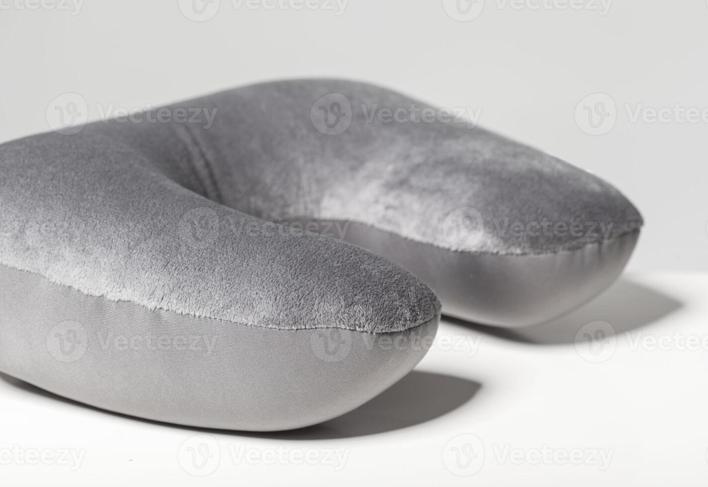 travel cervical pillow isolated on a white background photo