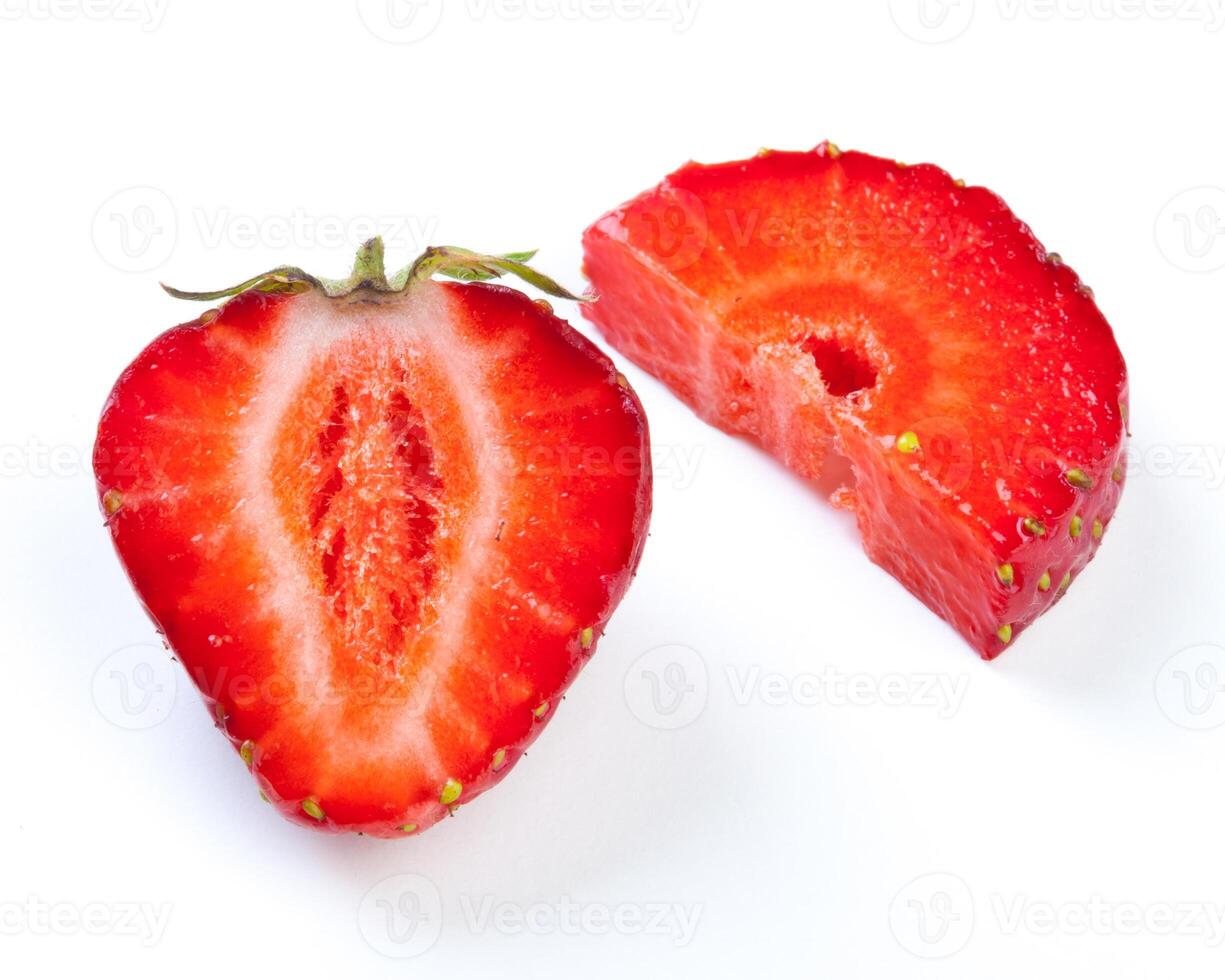 Strawberry. Piece and slice isolated photo