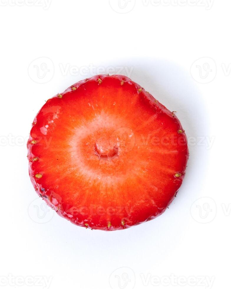 Strawberry. Piece and slice isolated photo