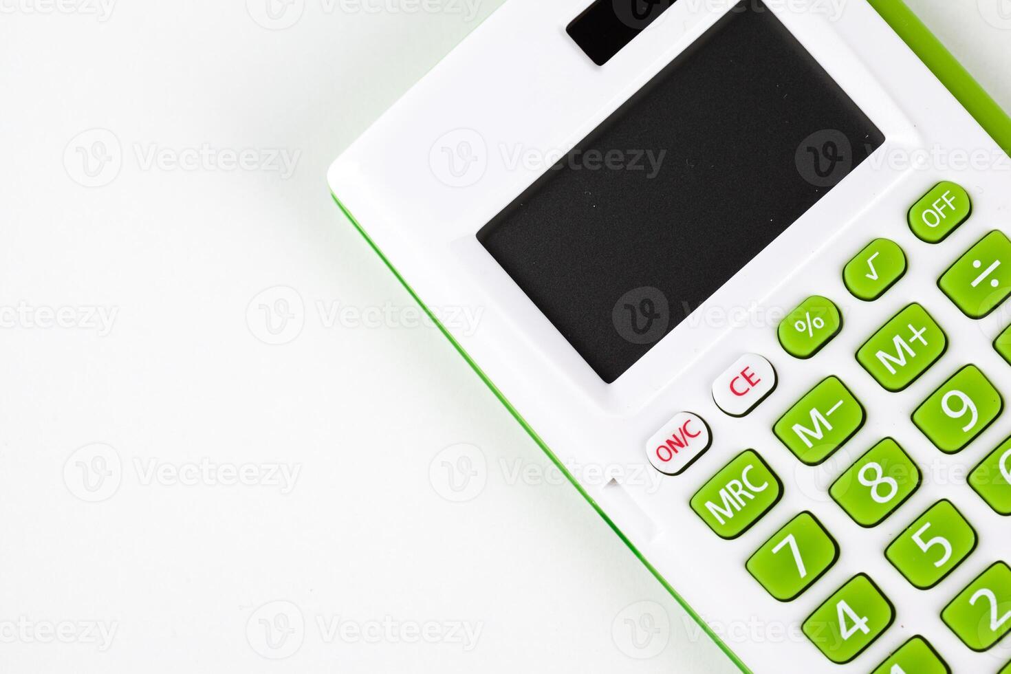 Top view of a calculator isolated on white background photo
