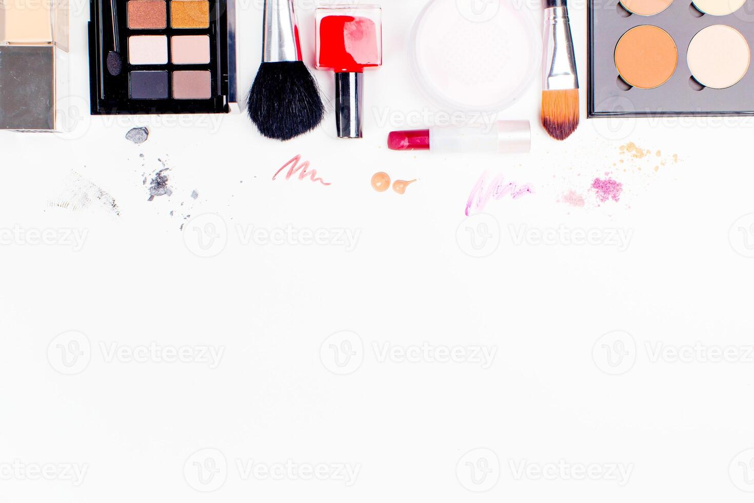 Brush and cosmetic isolated on a white background. Top view. photo