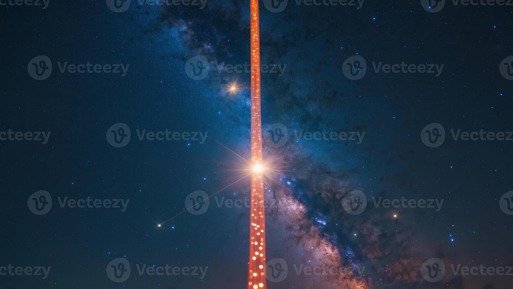 Bright cosmic tower illuminated in the night sky showcasing a breathtaking view of the universe photo