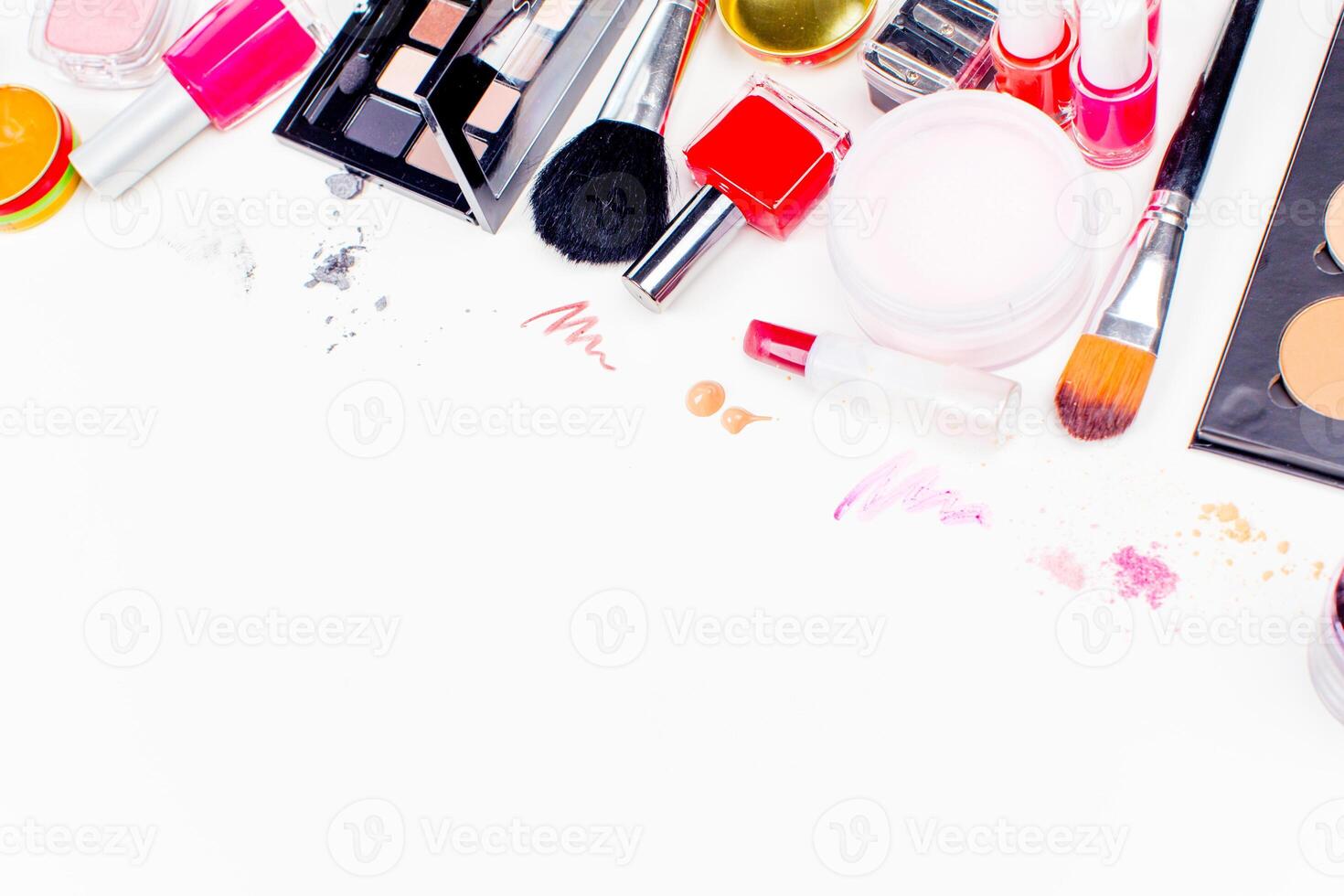 Brush and cosmetic isolated on a white background. Top view. photo