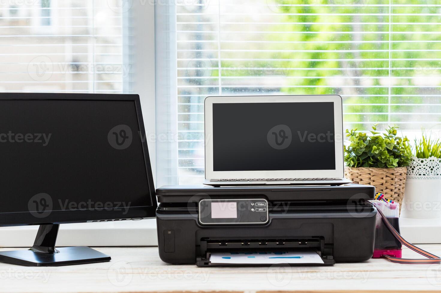 Printer and computer. Office table photo