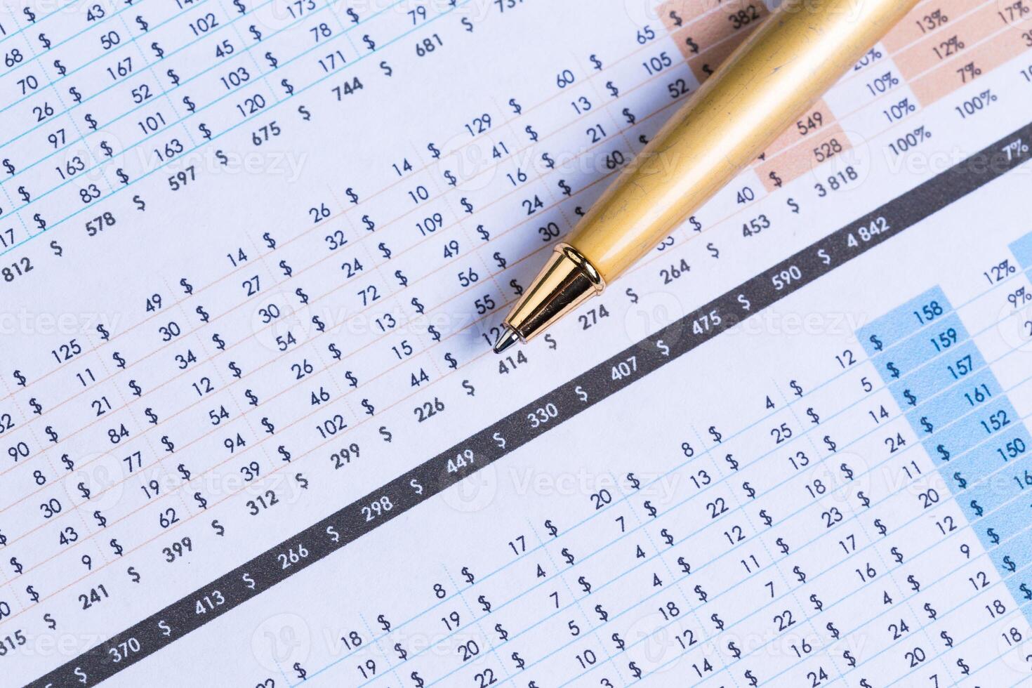 Business performance graph with ballpoint pen photo
