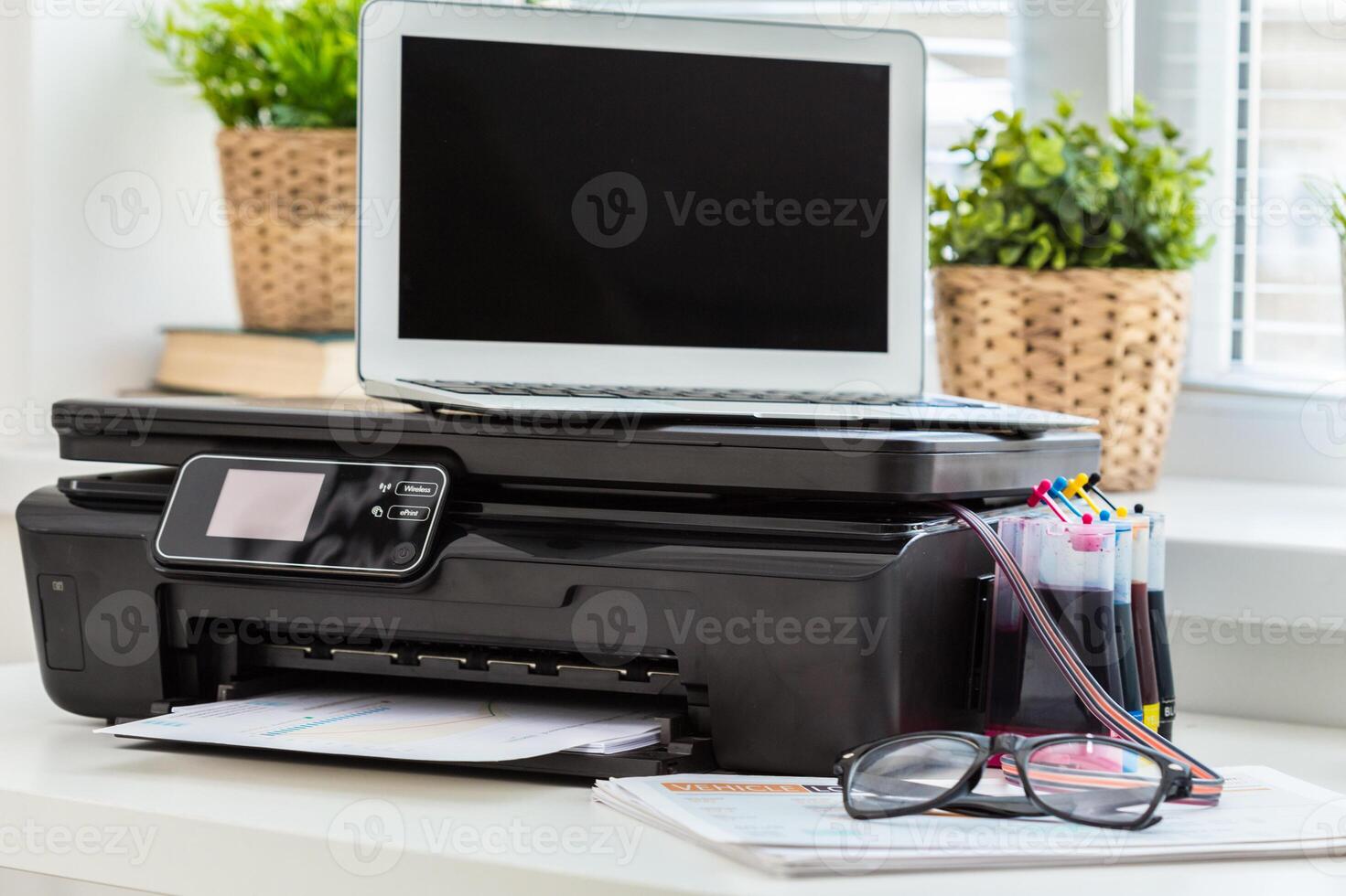 Printer and computer. Office table photo