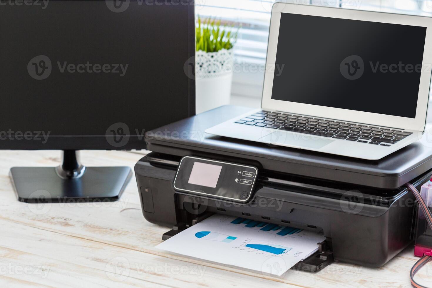 Printer and computer. Office table photo