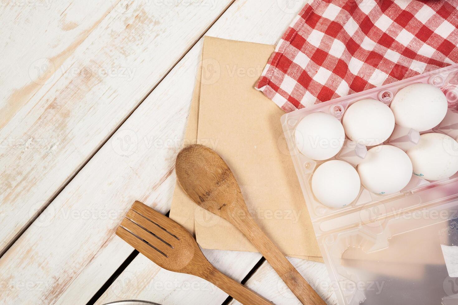 baking preparation, top view of a variety of baking utensils and ingredients photo