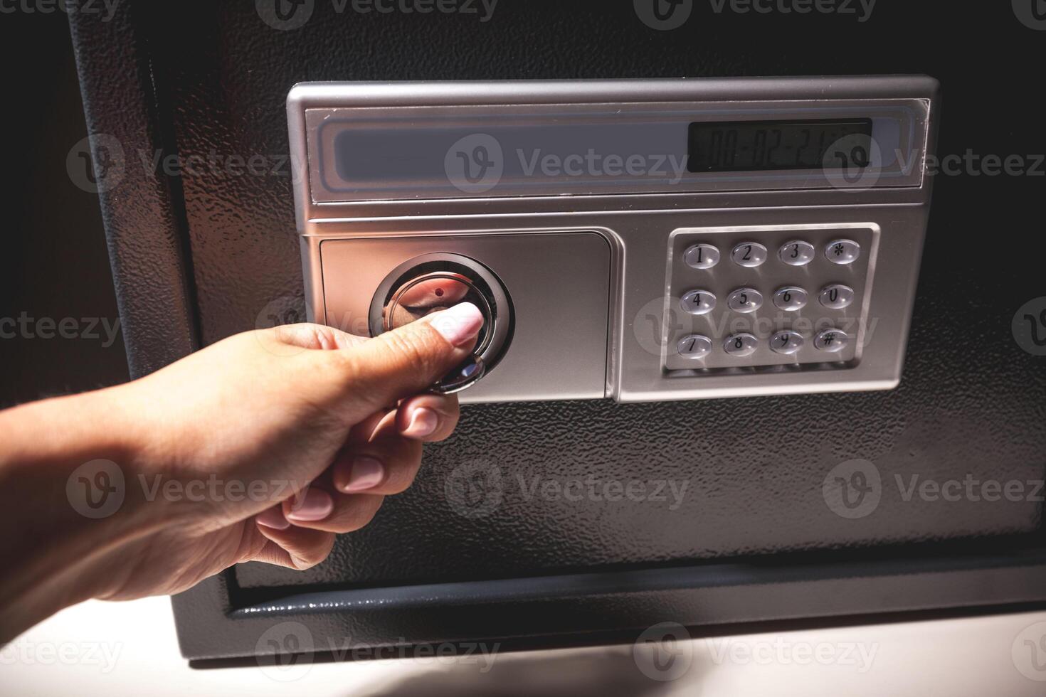 hand opened a safe, close up photo