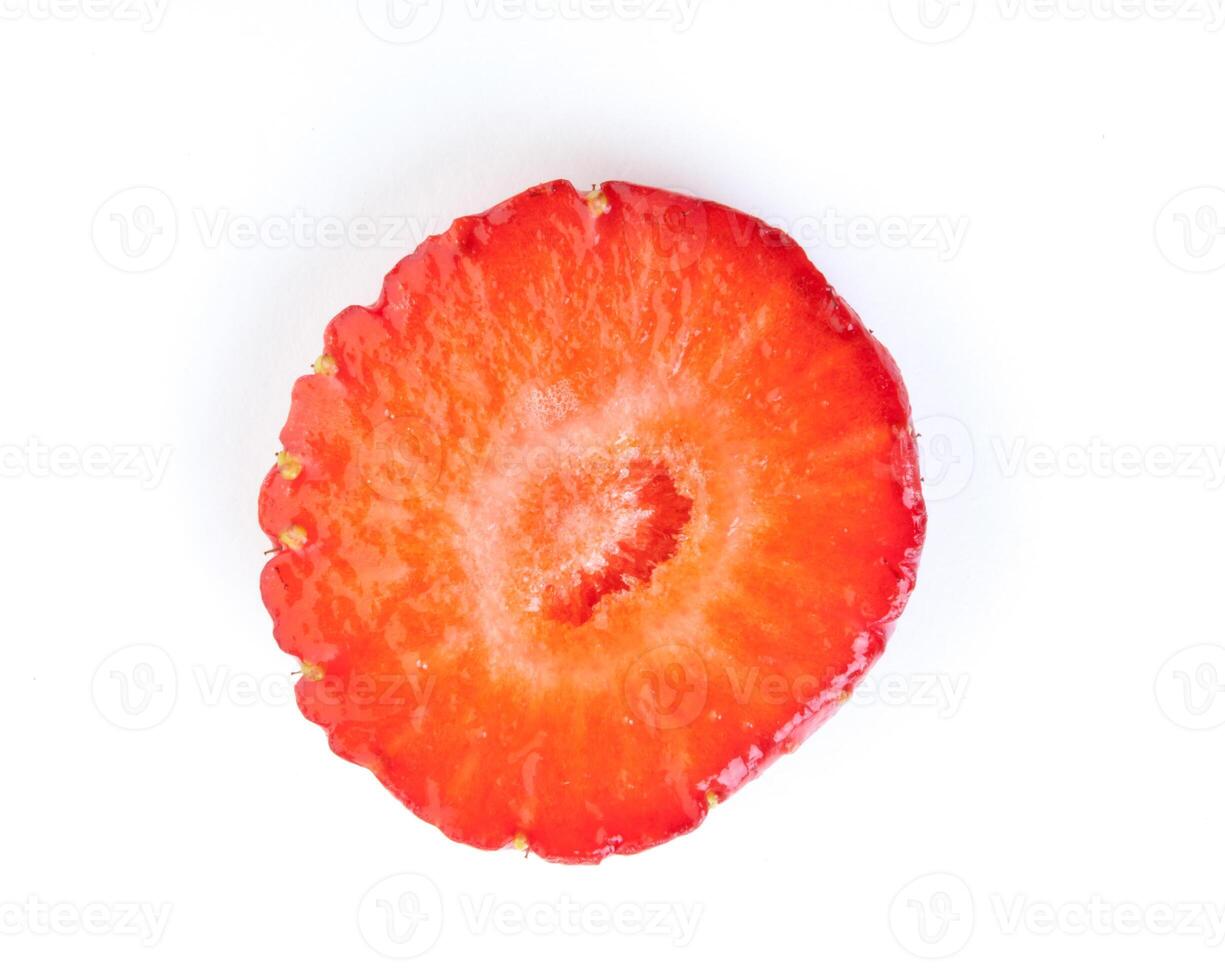 Strawberry. Piece and slice isolated photo