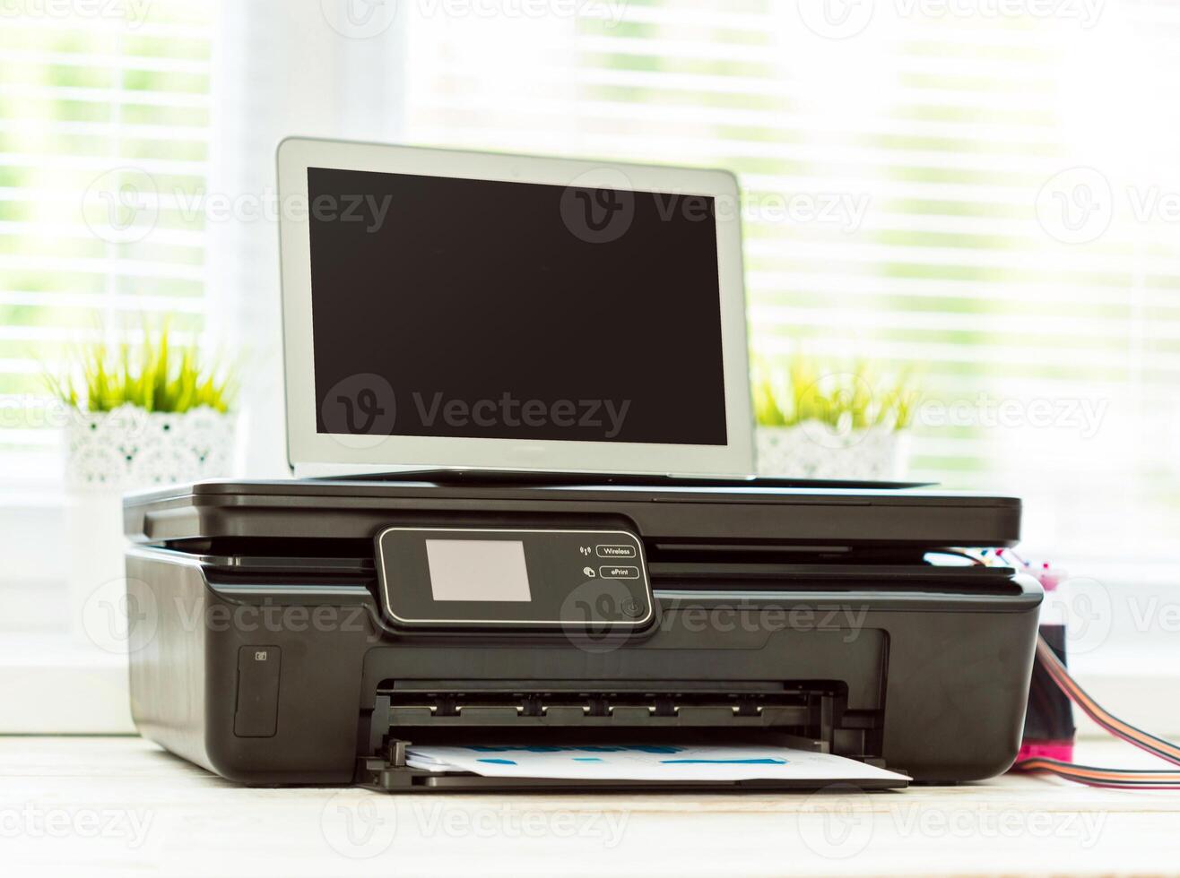 Printer and computer. Office table photo