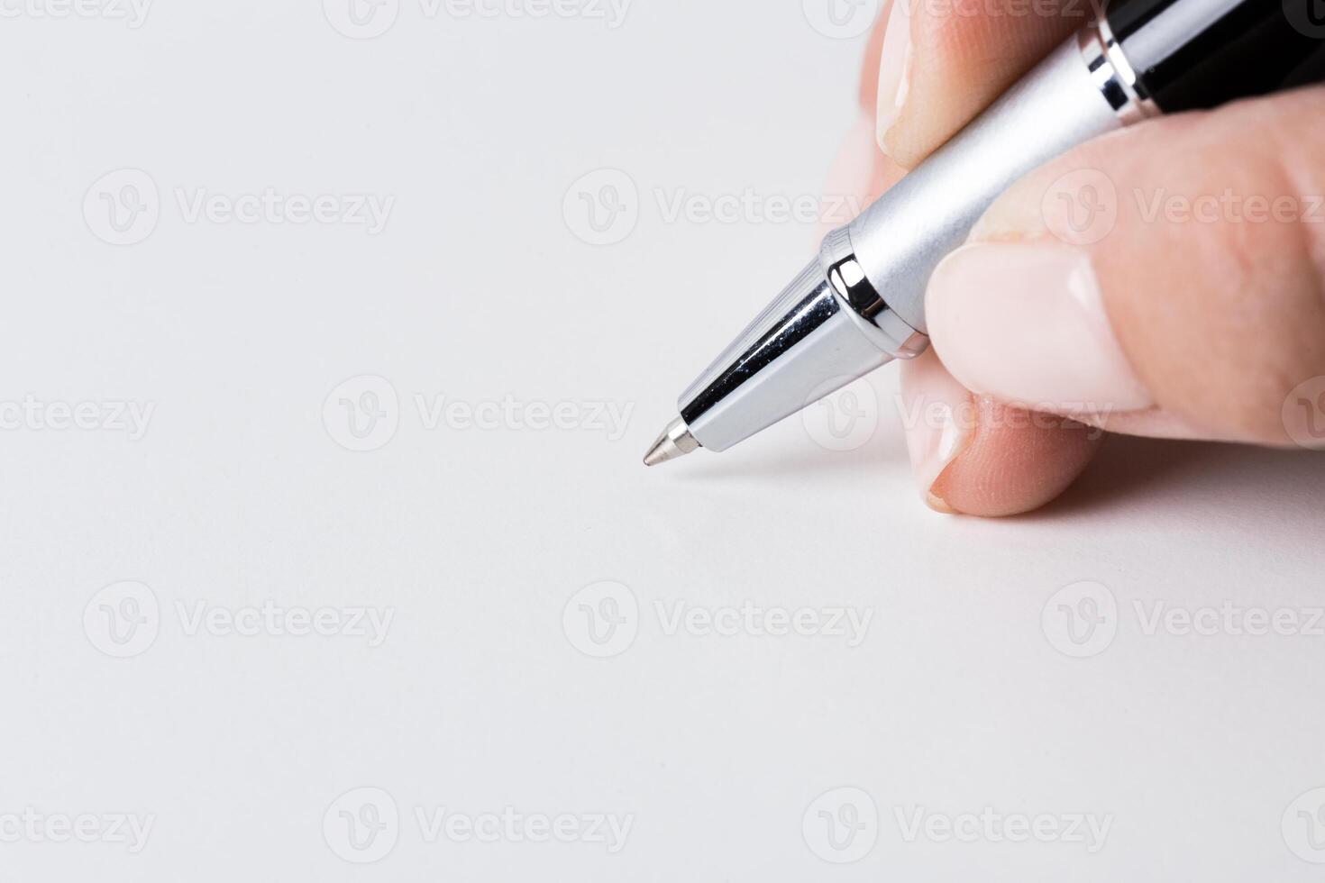 Pen in hand photo