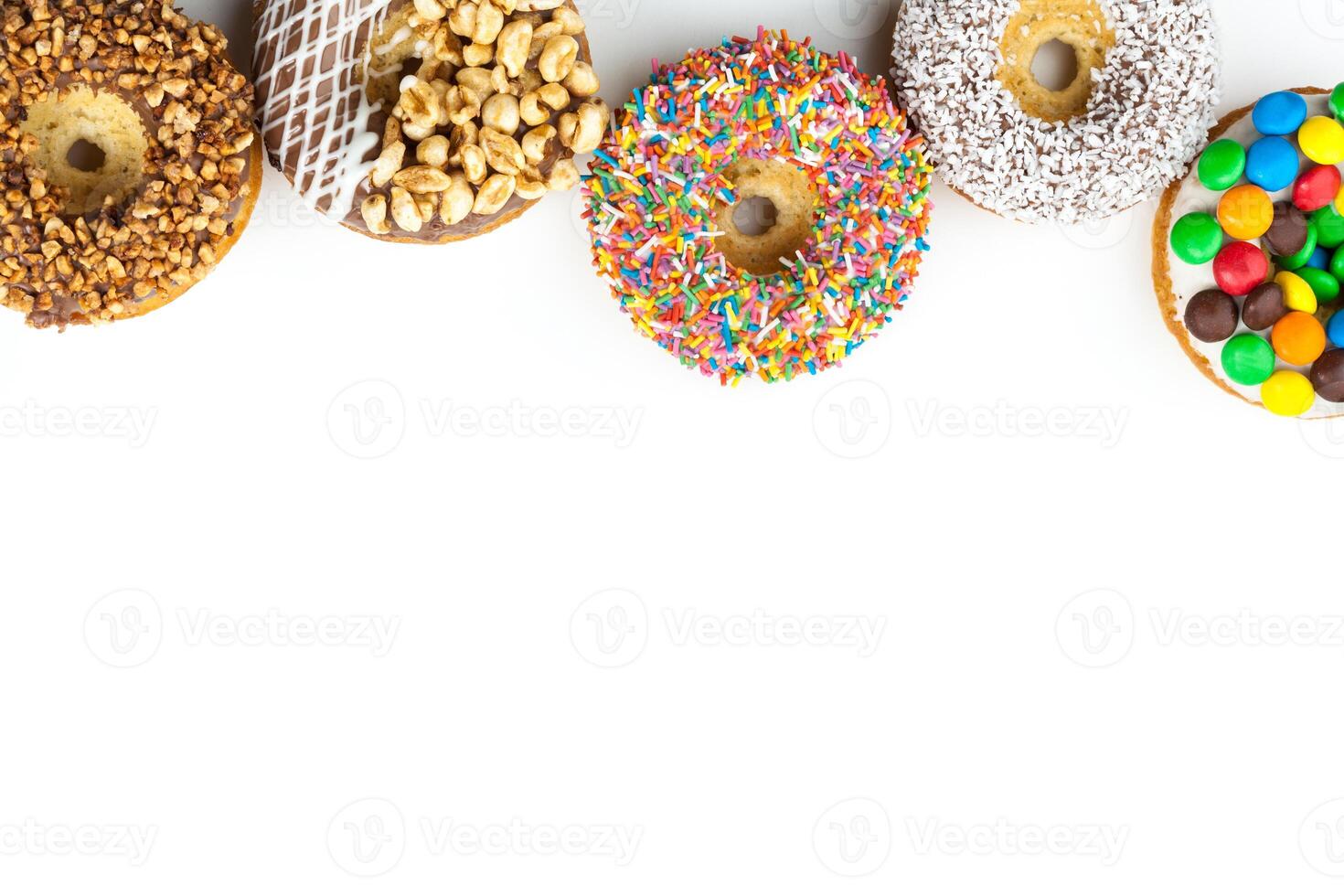 various donuts on white background photo