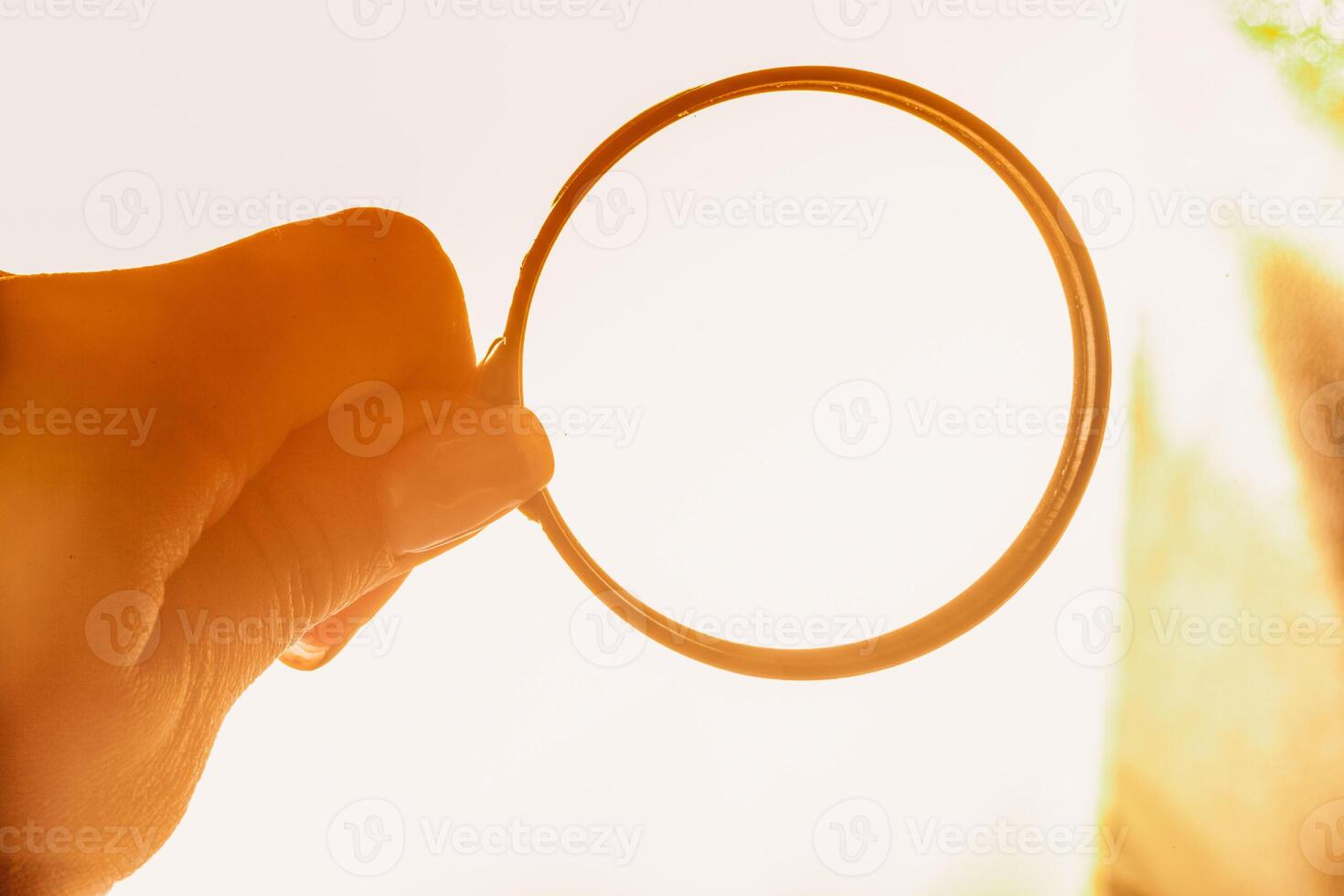Magnifying Glass in the Hand photo