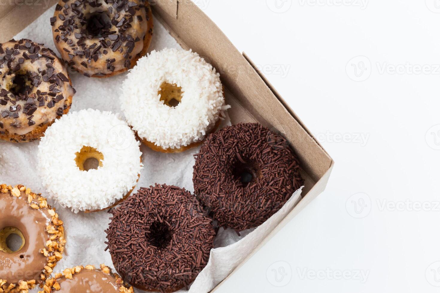 sweet donuts in a paper box photo