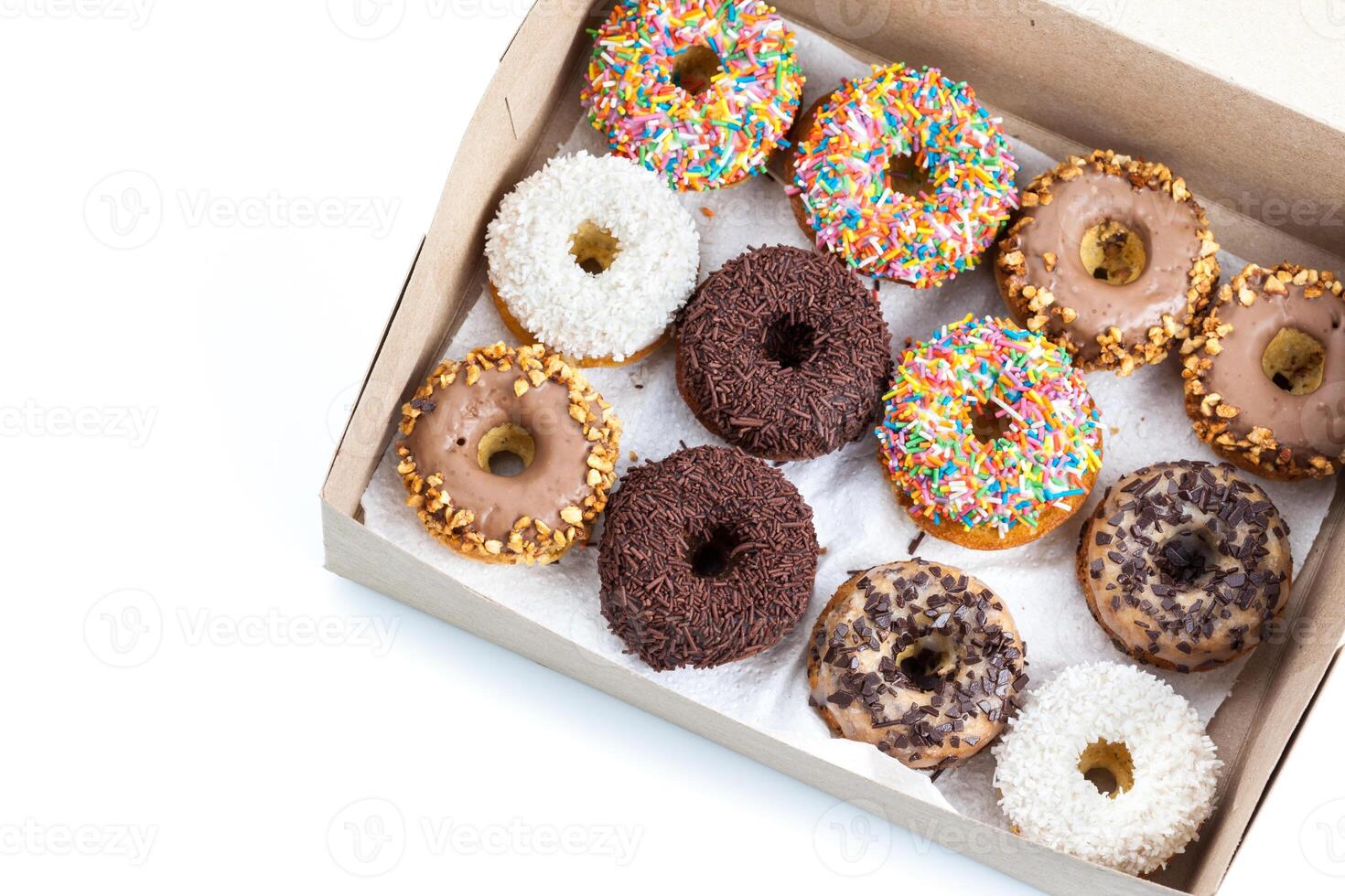sweet donuts in a paper box photo