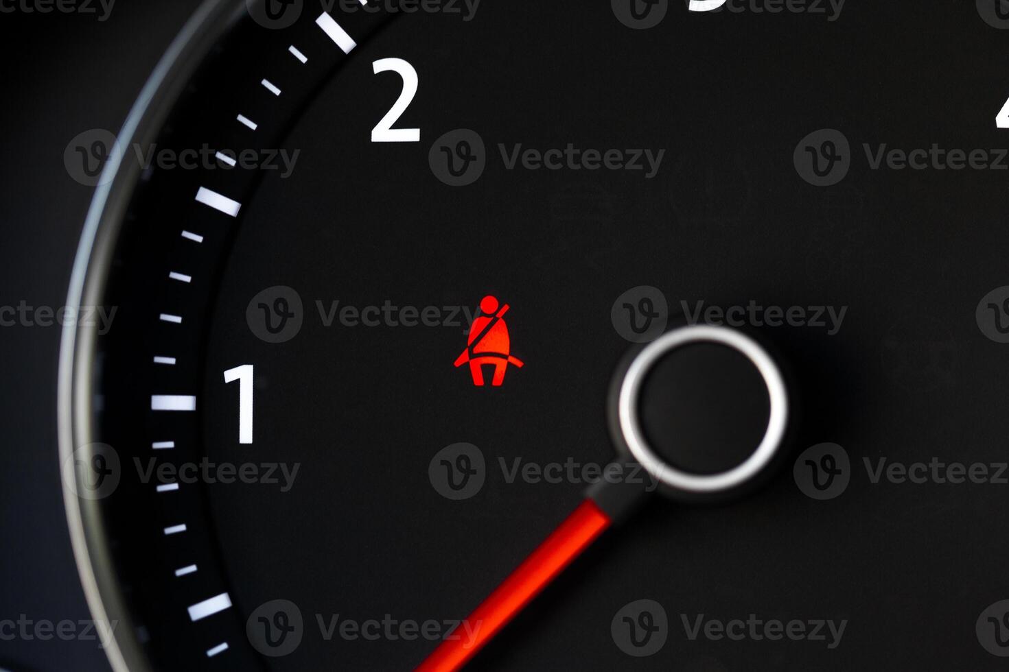 Close up shot of a speedometer in a car photo