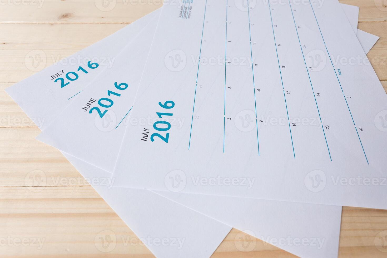 Closeup of numbers on calendar page photo