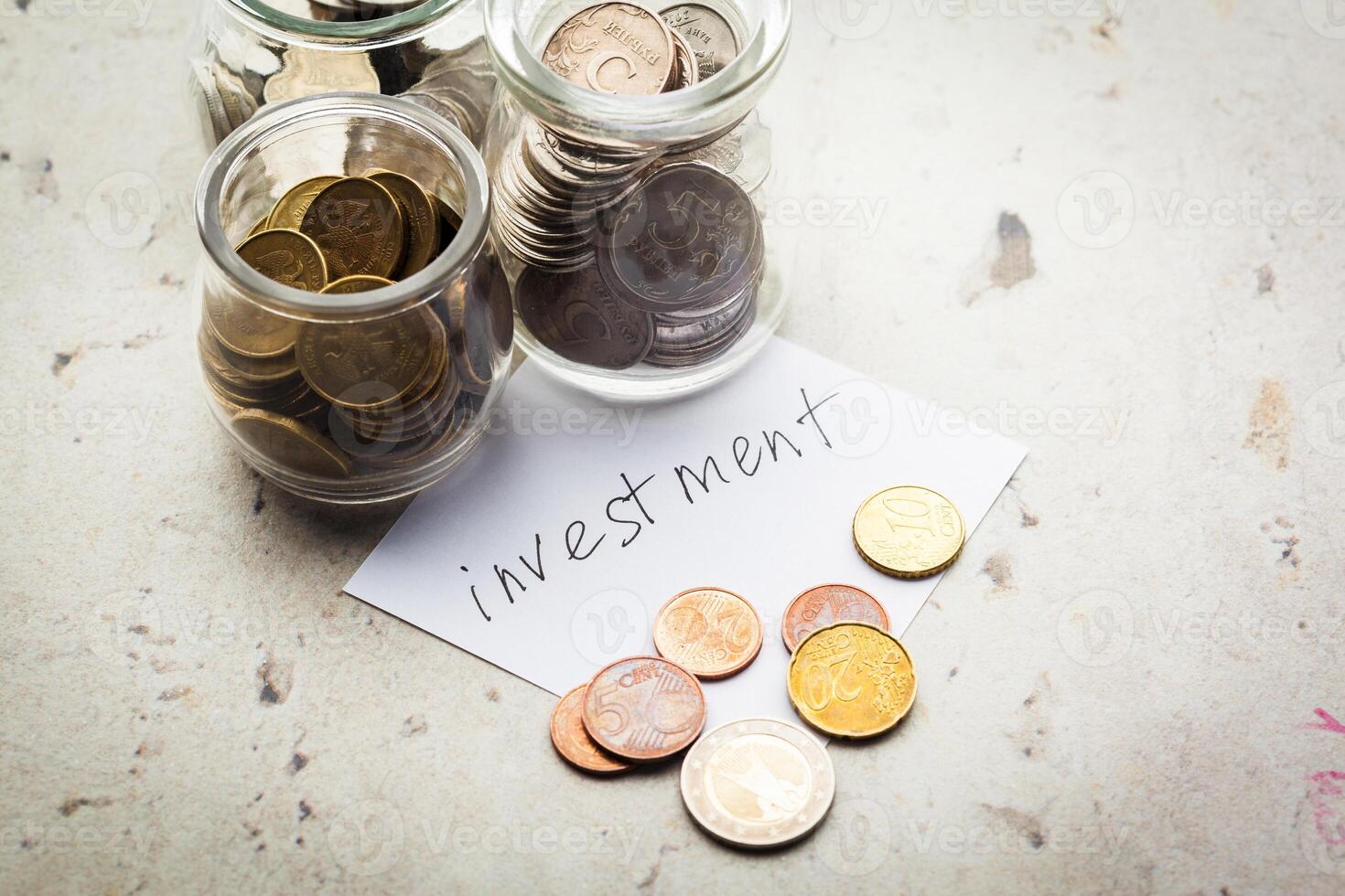Money jar with coins photo