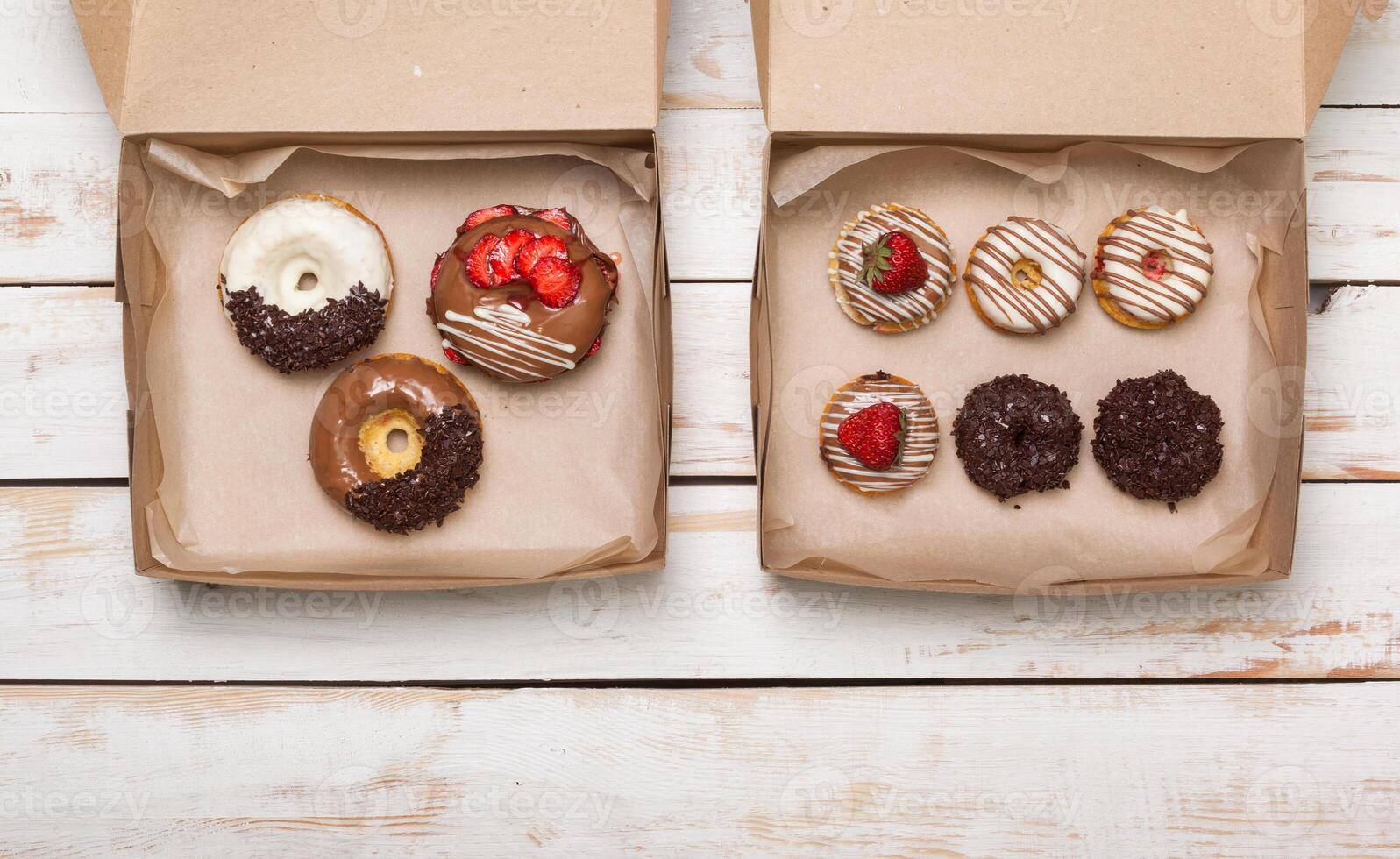 Colorful donuts in box photo