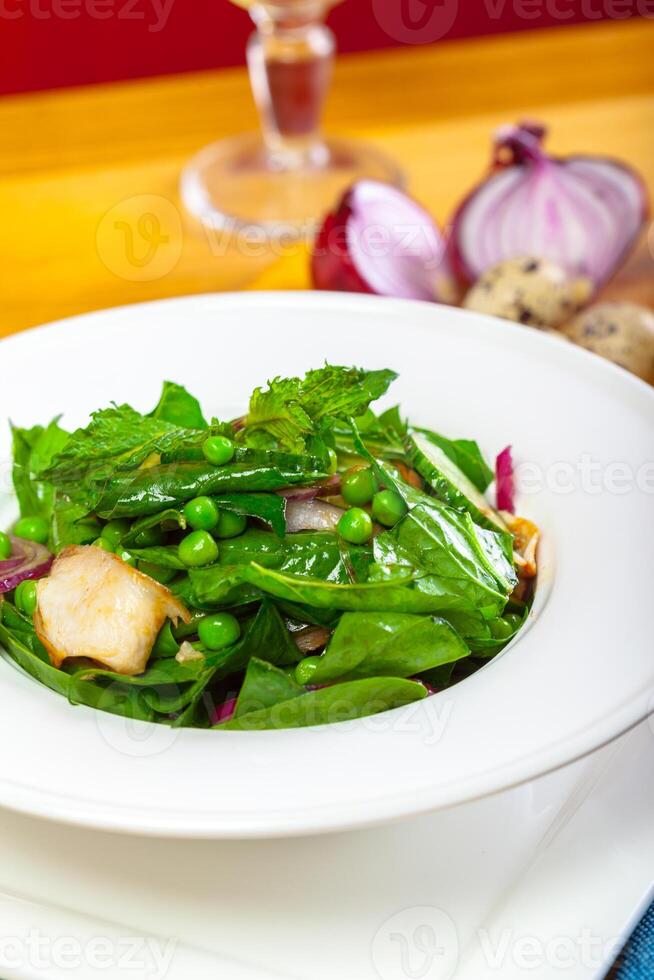 Fresh green salad with spinach photo