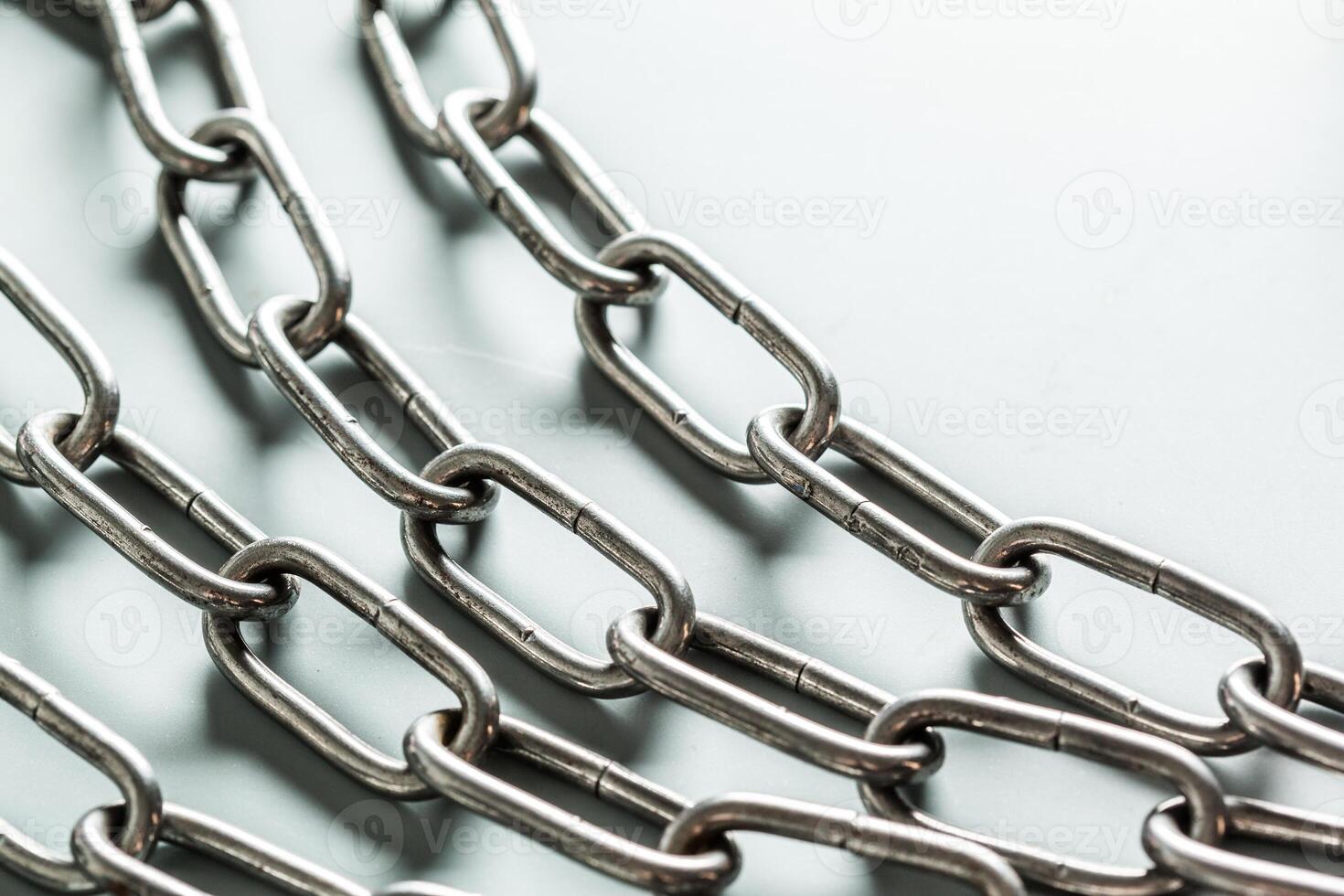close up of metal chain part on white background photo