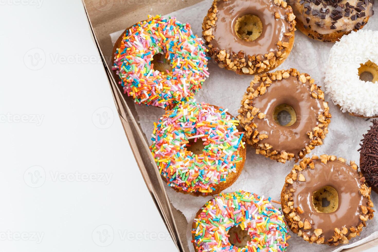 sweet donuts in a paper box photo