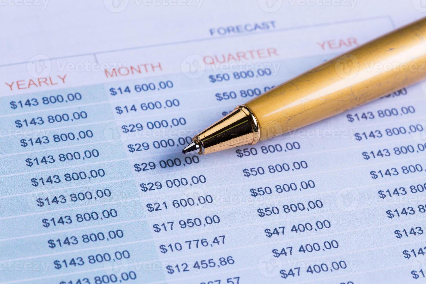 Business performance graph with ballpoint pen photo