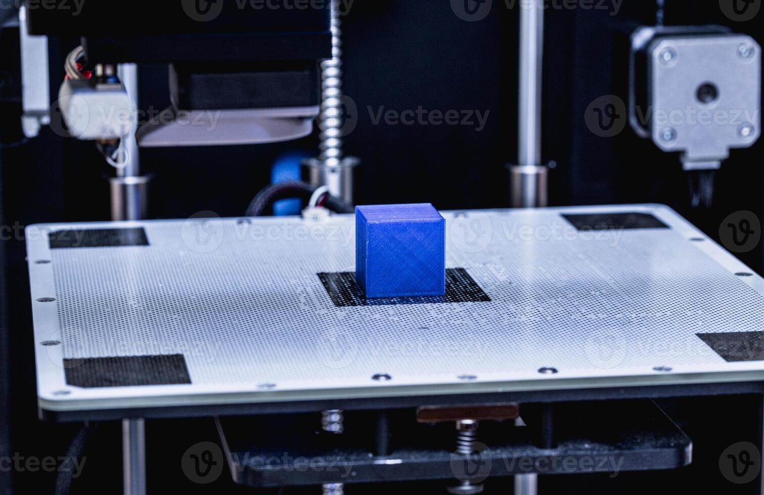 head of 3d printer in action photo