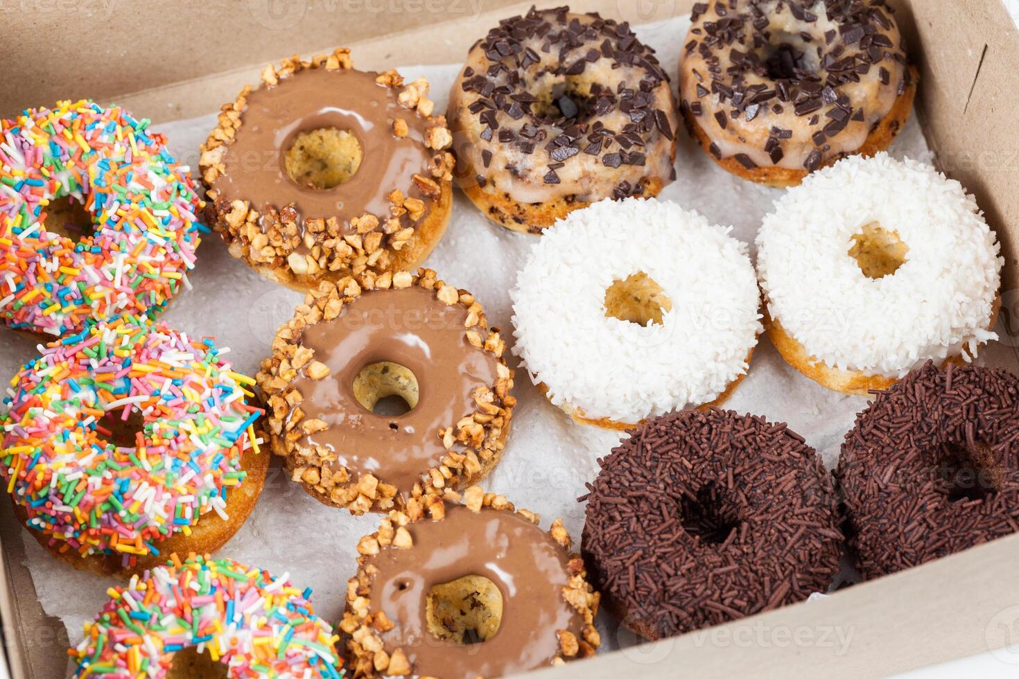 sweet donuts in a paper box photo